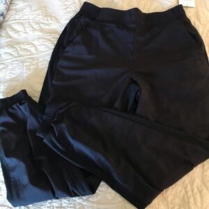 Athleta lined black joggers. Lite black camouflage detail. Size 8